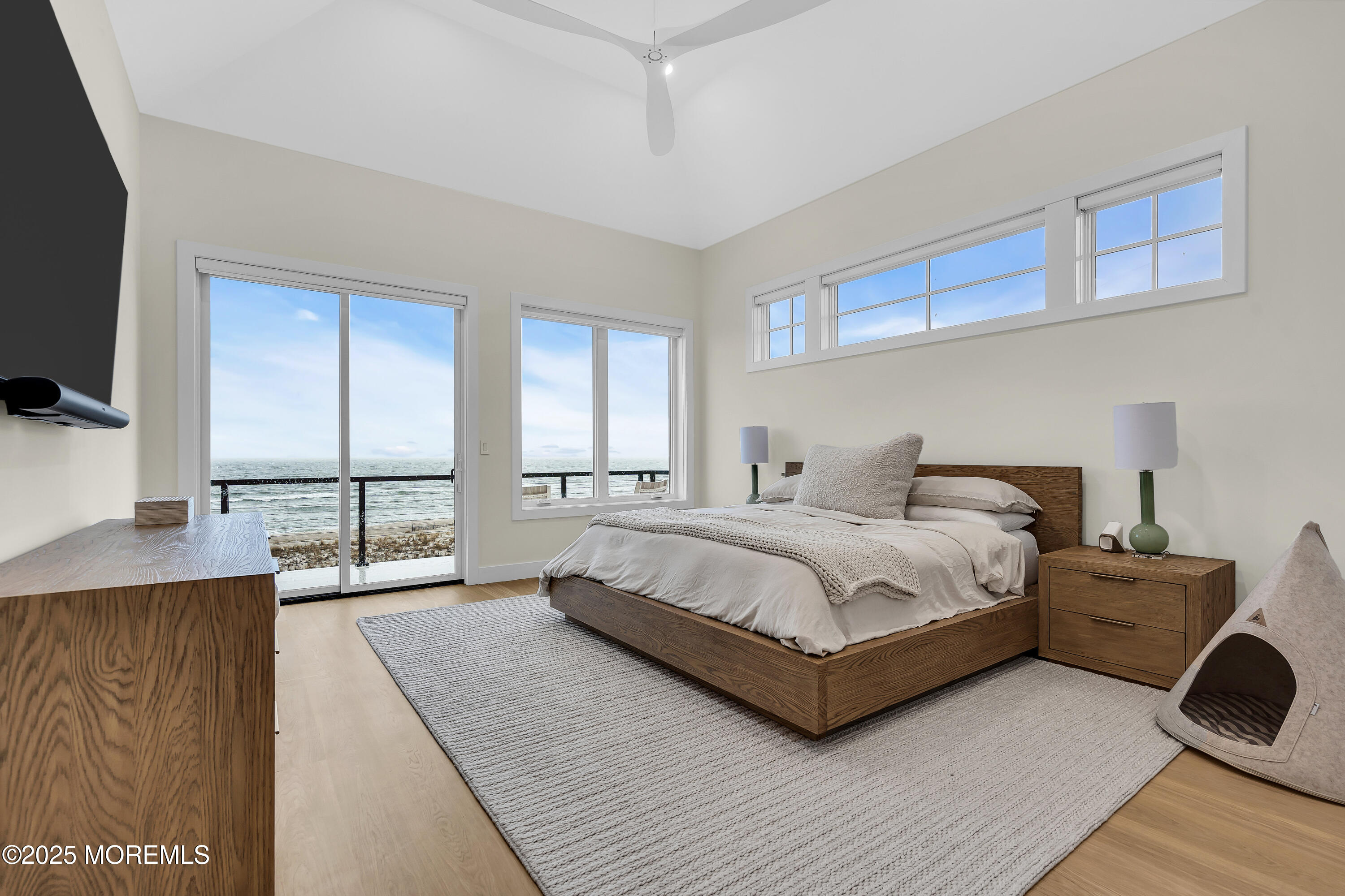 3580 Ocean Terrace Lavallette, NJ 08735 - Photo 20 of 51 a bedroom with a bed and a flat screen tv