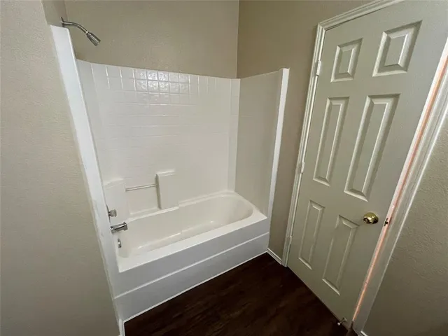 a bathroom with a bathtub