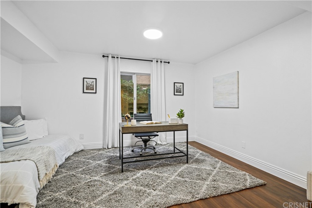 24609 Skyridge Drive Newhall, CA 91321 - Photo 18 of 60 a living room with furniture and a window