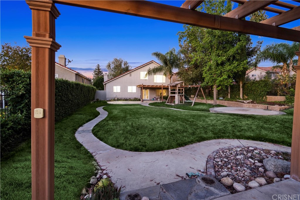 24609 Skyridge Drive Newhall, CA 91321 - Photo 40 of 60 a front view of a house with a yard
