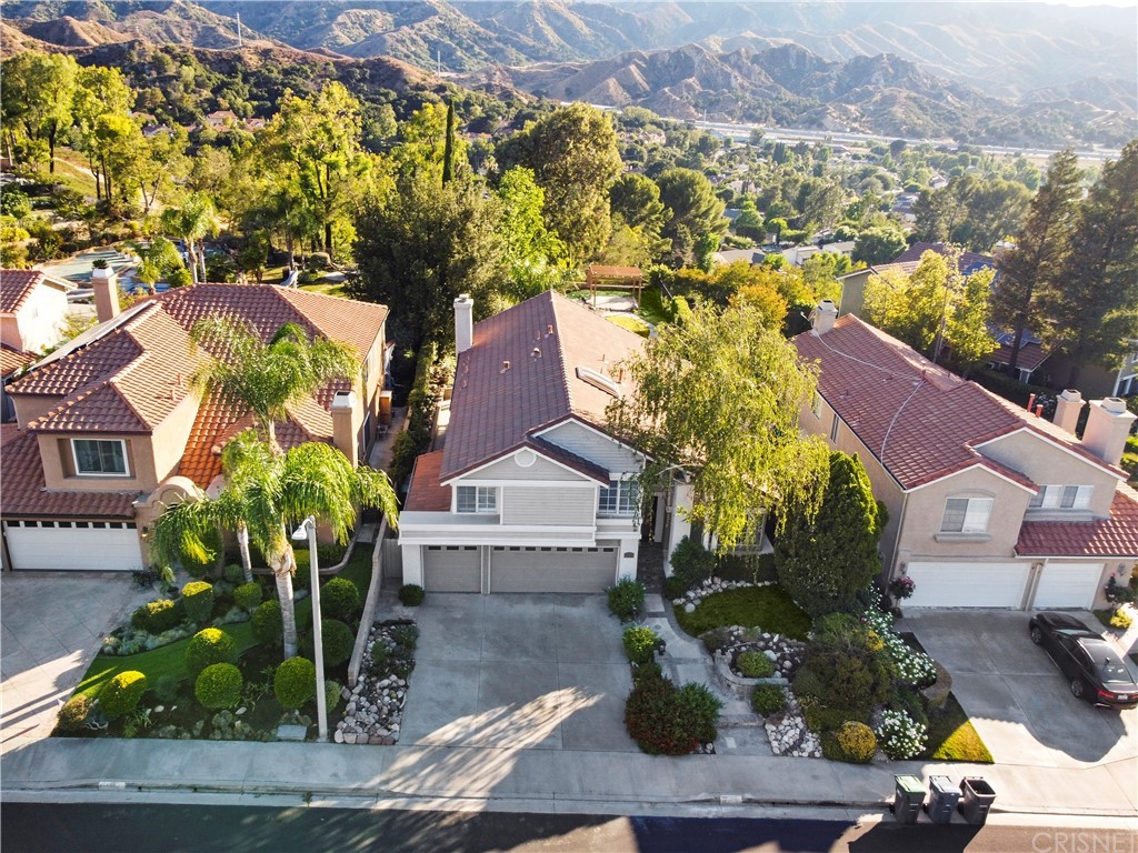 24609 Skyridge Drive Newhall, CA 91321 - Photo 49 of 60 an aerial view of a house with a garden