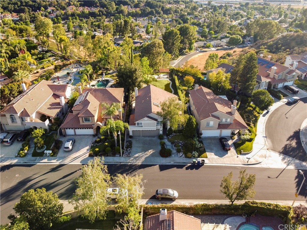 24609 Skyridge Drive Newhall, CA 91321 - Photo 51 of 60 an aerial view of a house with a yard and swimming pool