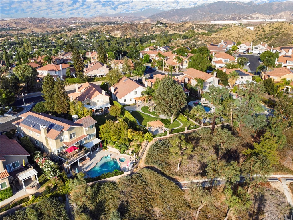 24609 Skyridge Drive Newhall, CA 91321 - Photo 54 of 60 an aerial view of residential houses with outdoor space