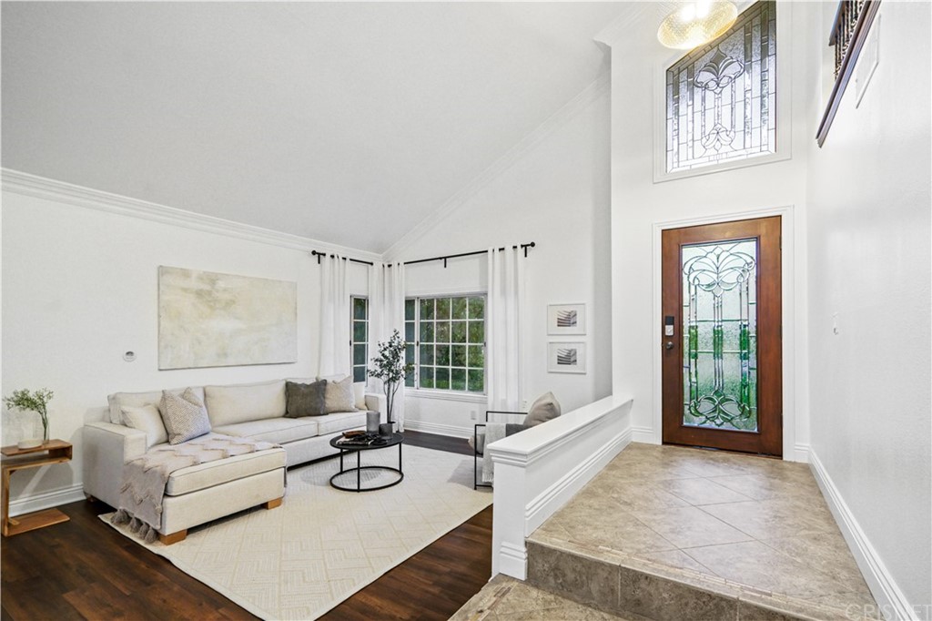 24609 Skyridge Drive Newhall, CA 91321 - Photo 7 of 60 a living room with furniture and a large window