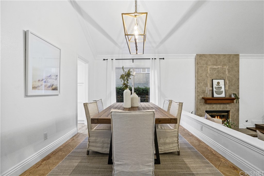 24609 Skyridge Drive Newhall, CA 91321 - Photo 8 of 60 a dining room with furniture and window