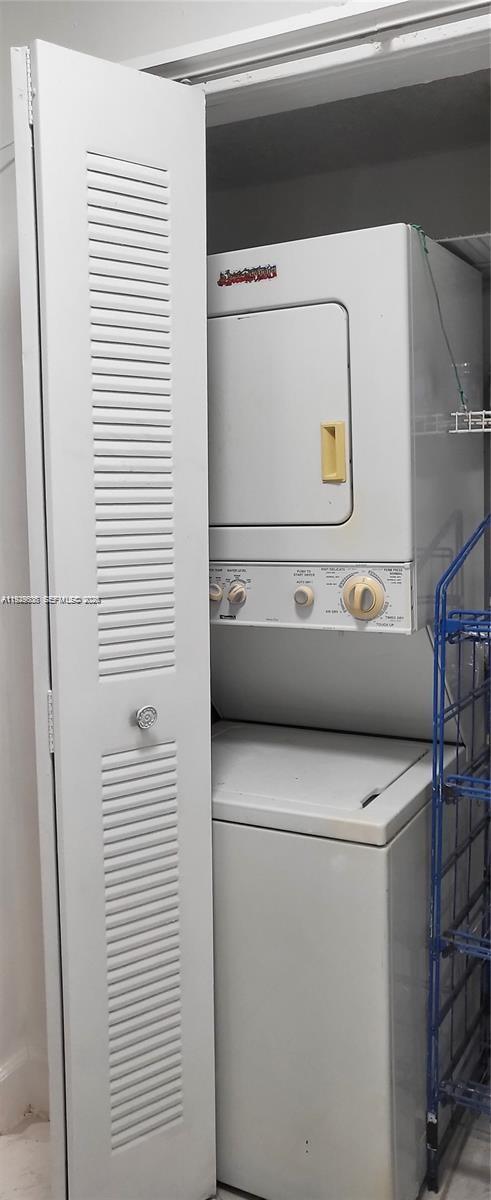 10641 Southwest 108th Avenue, Unit 1H Miami, FL 33176 - Photo 20 of 22 a utility room with dryer and washer