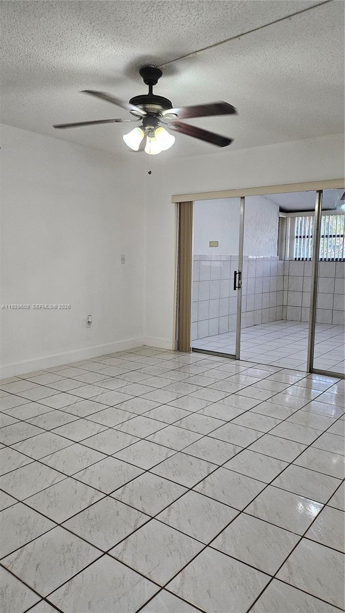 10641 Southwest 108th Avenue, Unit 1H Miami, FL 33176 - Photo 21 of 22 a view of an empty room