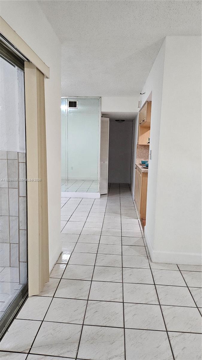 10641 Southwest 108th Avenue, Unit 1H Miami, FL 33176 - Photo 4 of 22 a view of a utility room with windows