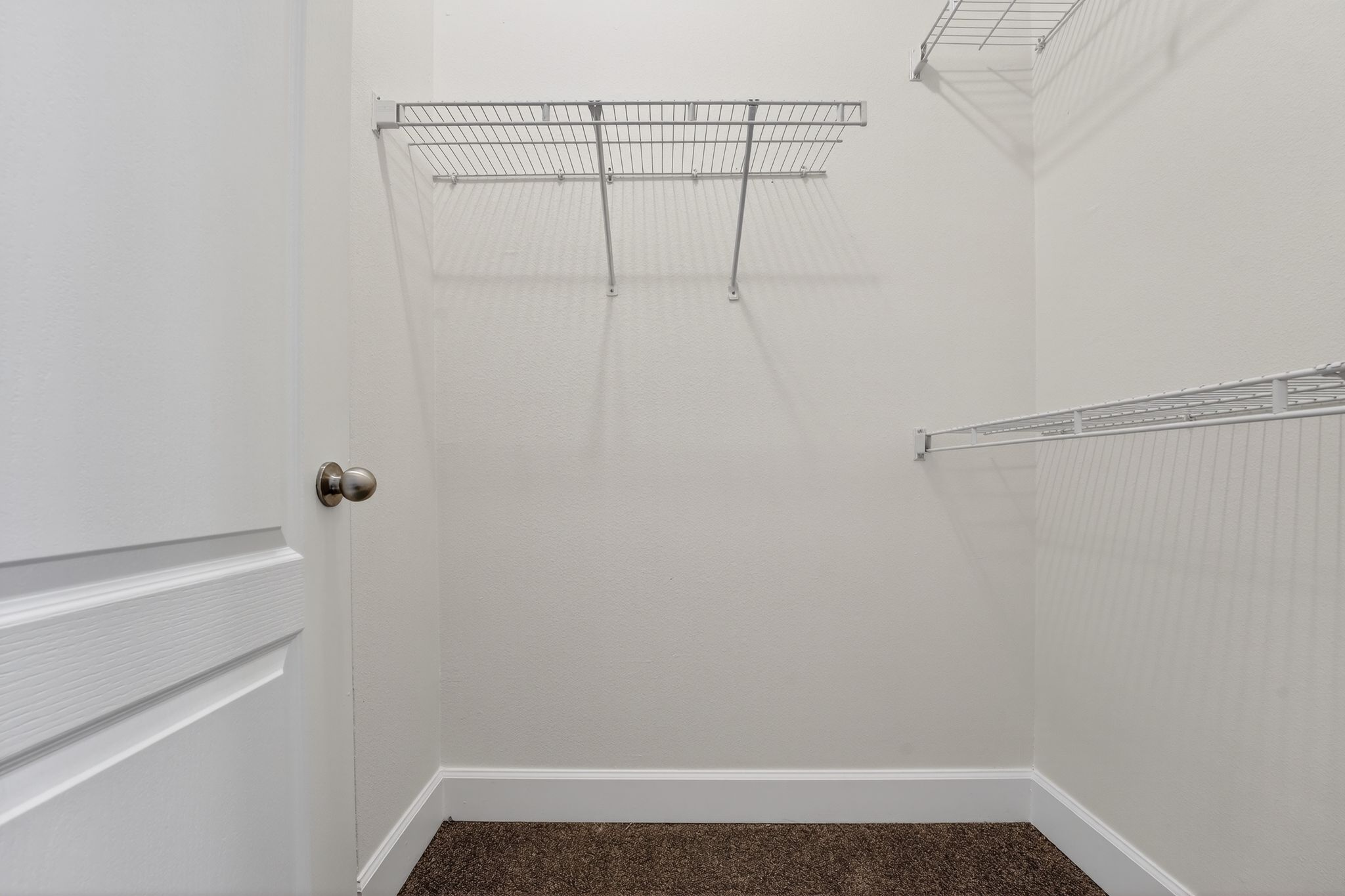 1901 Crossing Place, Unit 2201A Austin, TX 78741 - Photo 11 of 23 a view of small space with racks on the wall