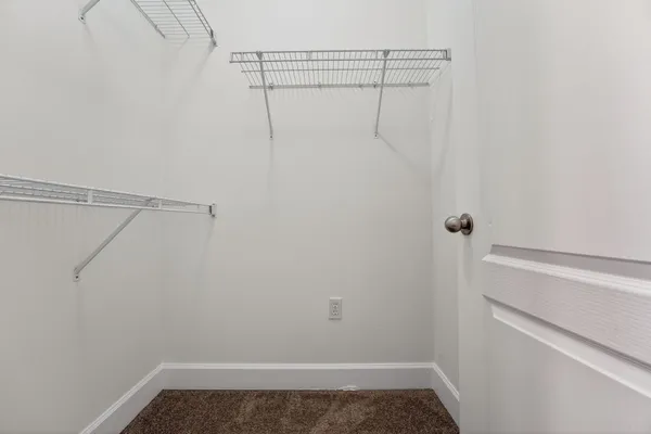 a view of small space with racks on the wall