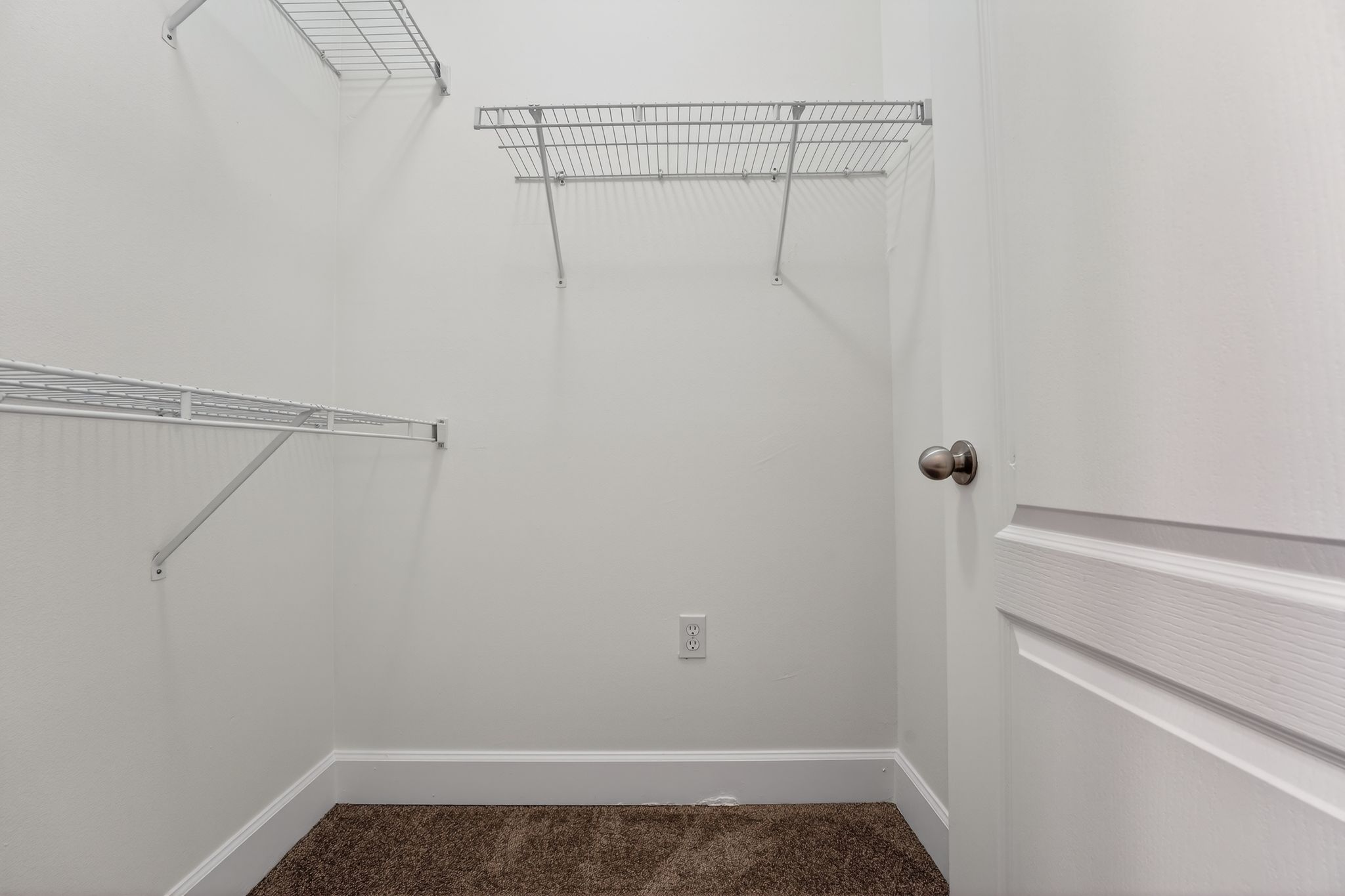 1901 Crossing Place, Unit 2201A Austin, TX 78741 - Photo 12 of 23 a view of small space with racks on the wall