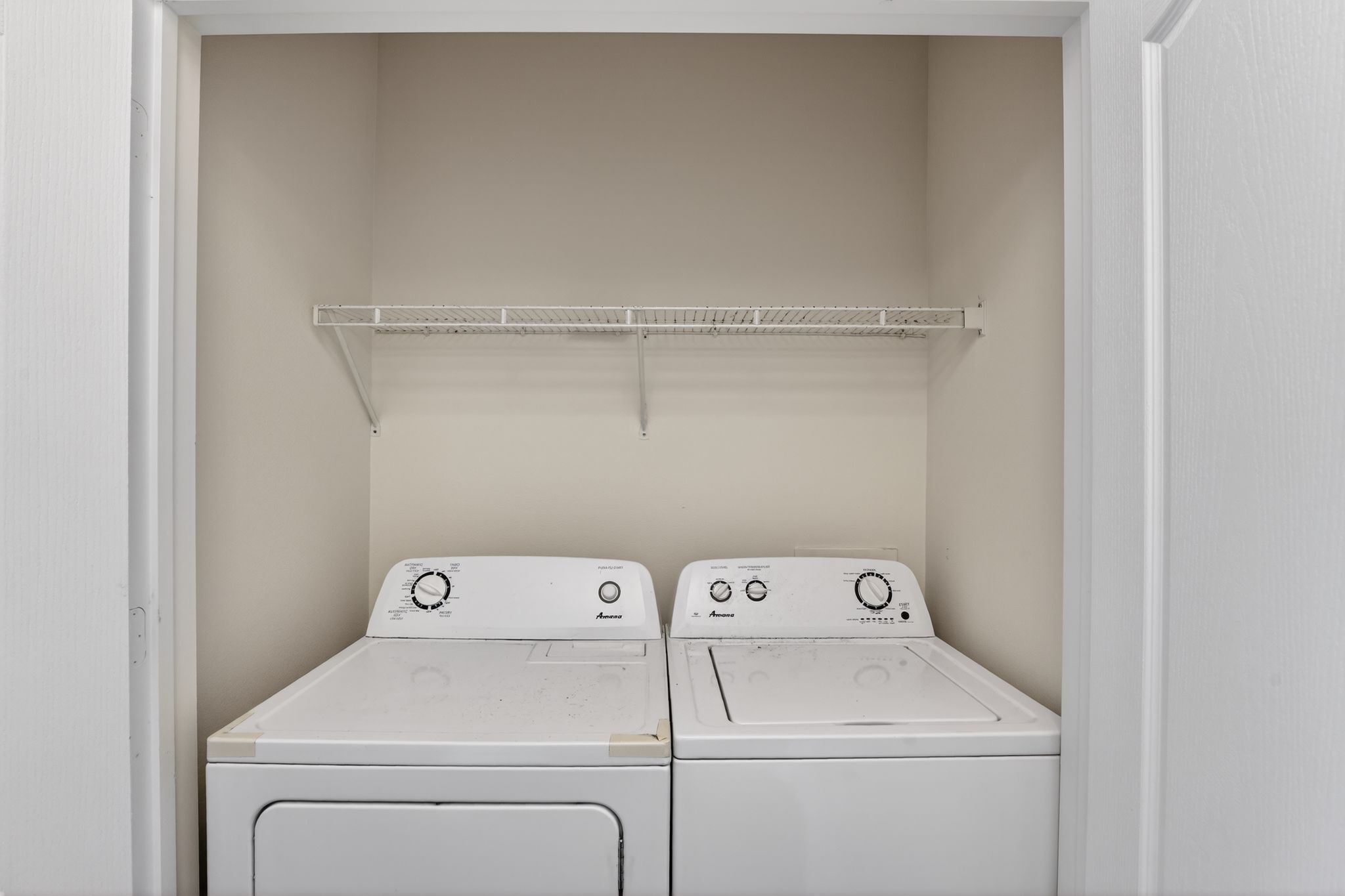 1901 Crossing Place, Unit 2201A Austin, TX 78741 - Photo 13 of 23 a utility room with dryer and washer