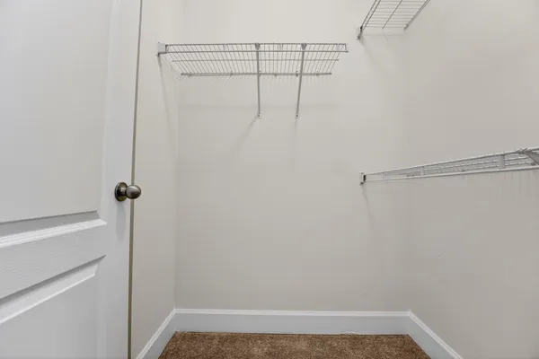 a view of small space with racks on the wall