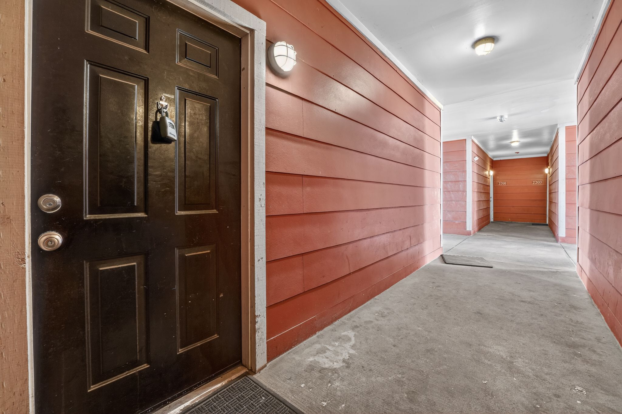 1901 Crossing Place, Unit 2201A Austin, TX 78741 - Photo 21 of 23 a view of a hallway with some storage area