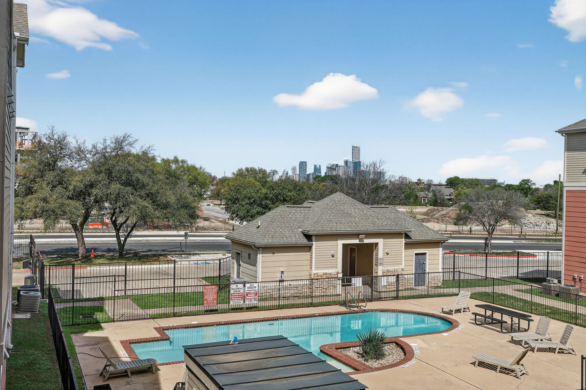 1901 Crossing Place, Unit 2201A Austin, TX 78741 - Photo 23 of 23 a view of a patio with swimming pool
