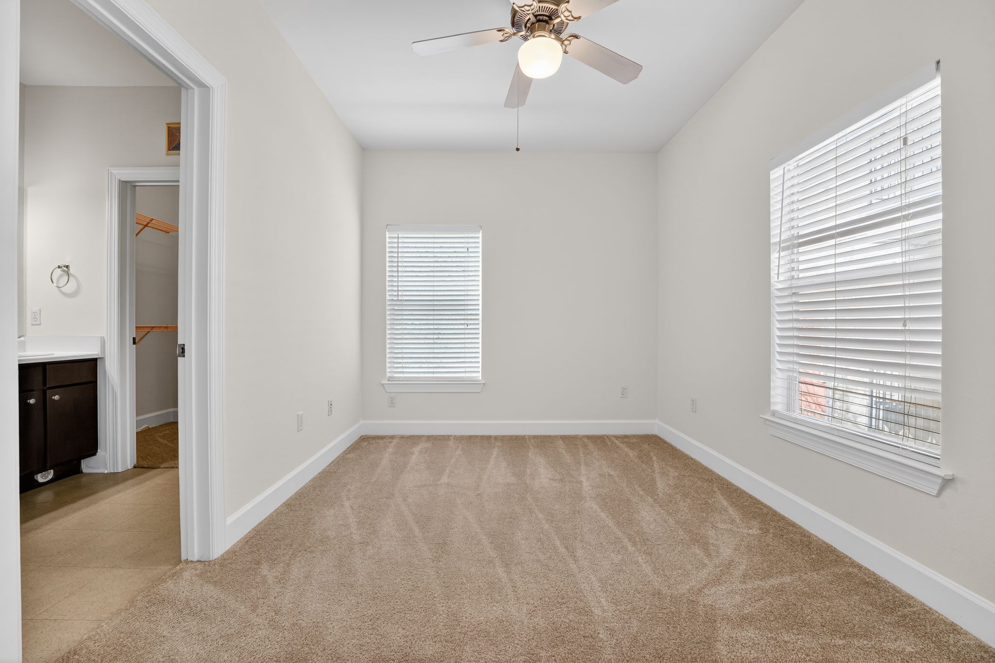 1901 Crossing Place, Unit 2201A Austin, TX 78741 - Photo 7 of 23 a view of an empty room with a window