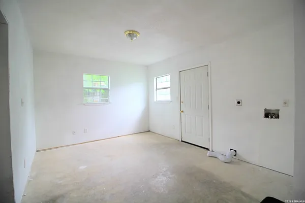 an empty room with windows