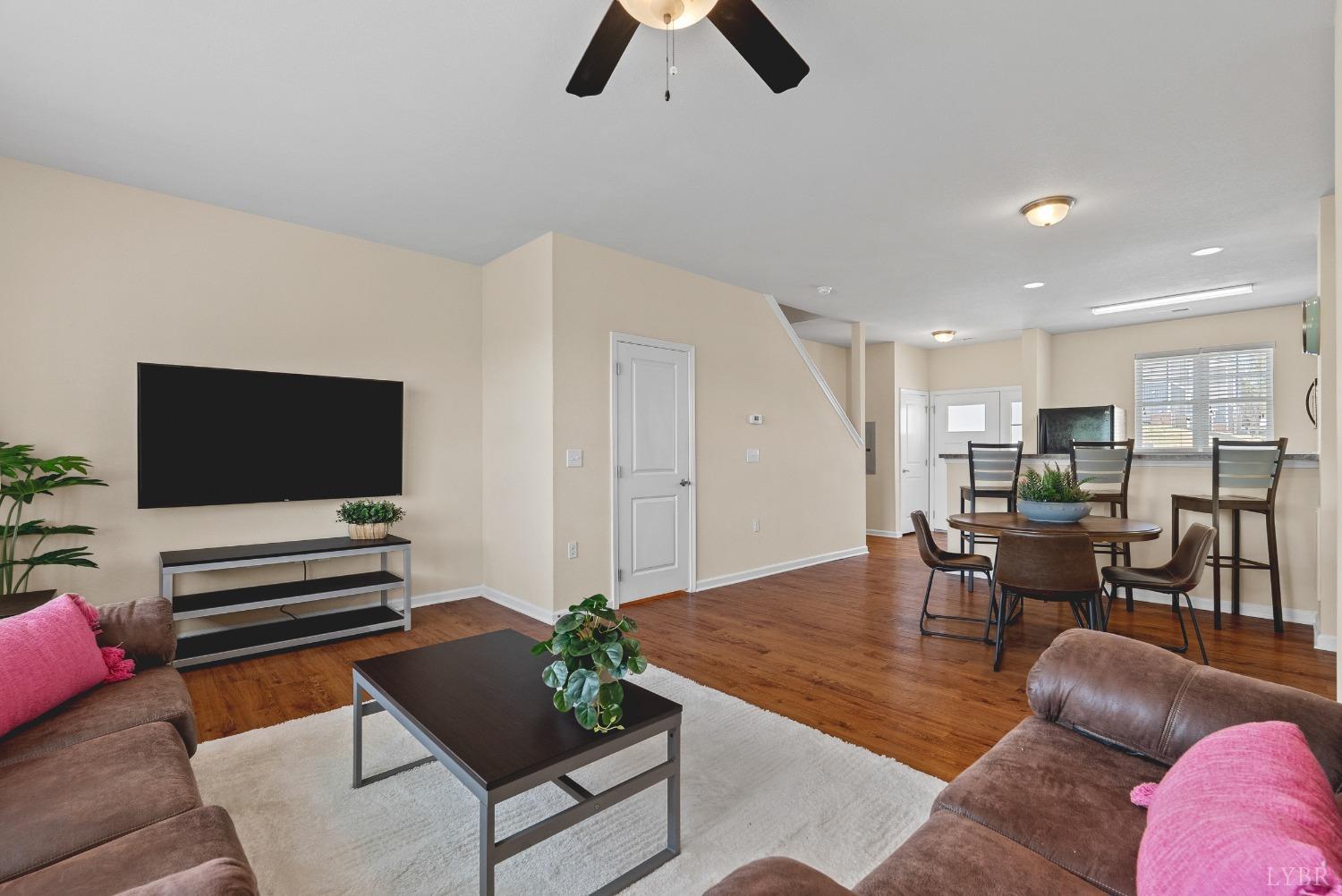 1600 Wards Ferry Road, Unit 706 Lynchburg, VA 24502 - Photo 14 of 49 a living room with furniture and a flat screen tv