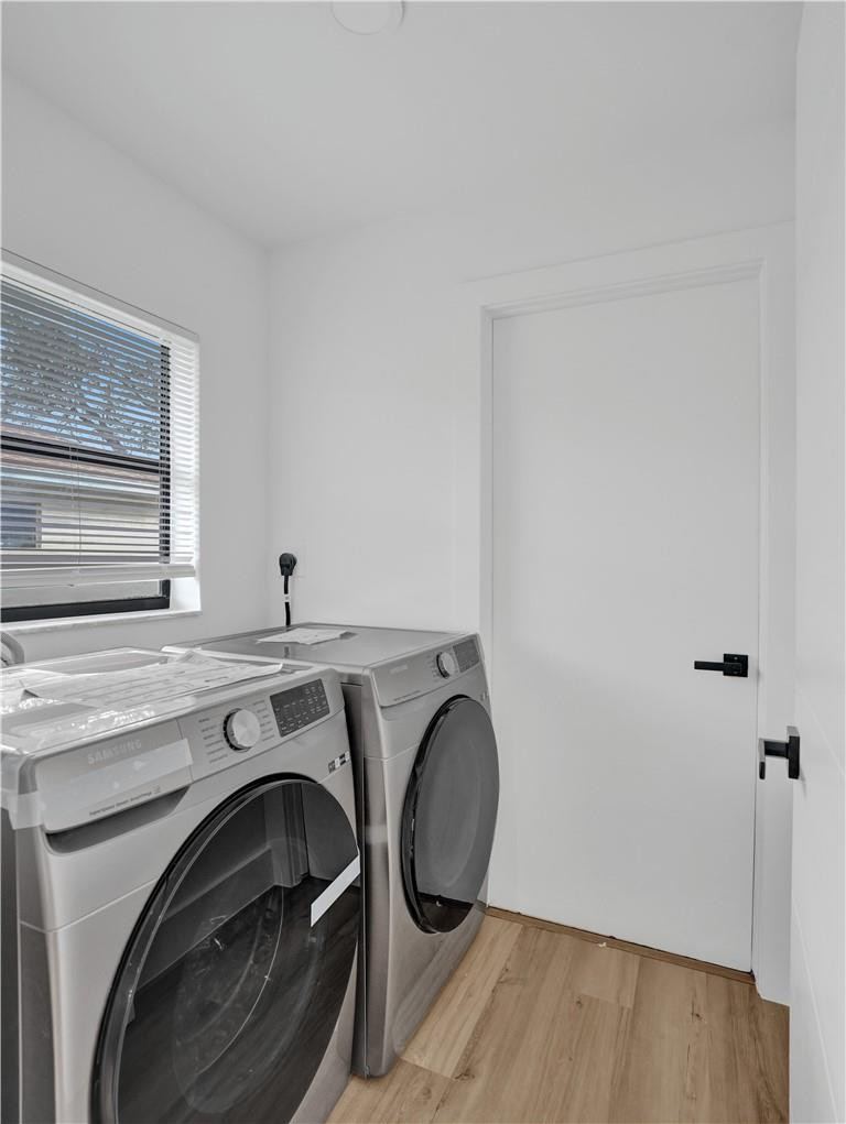 17702 Raintree Terrace Boca Raton, FL 33487 - Photo 39 of 67 a utility room with dryer and washer