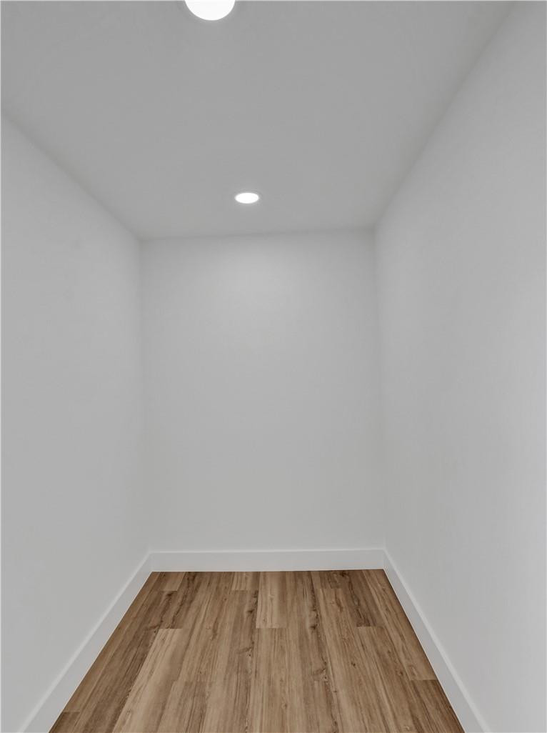 17702 Raintree Terrace Boca Raton, FL 33487 - Photo 50 of 67 a view of room with wooden floor and window