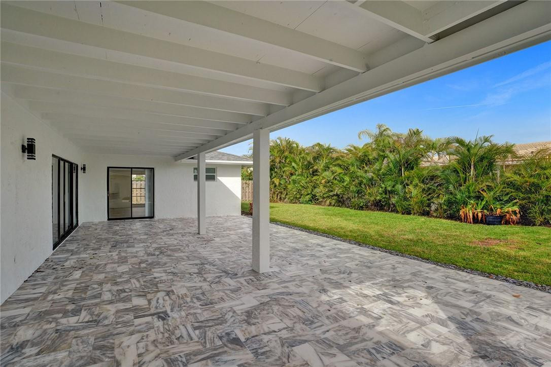 17702 Raintree Terrace Boca Raton, FL 33487 - Photo 60 of 67 a view of a big room with garden