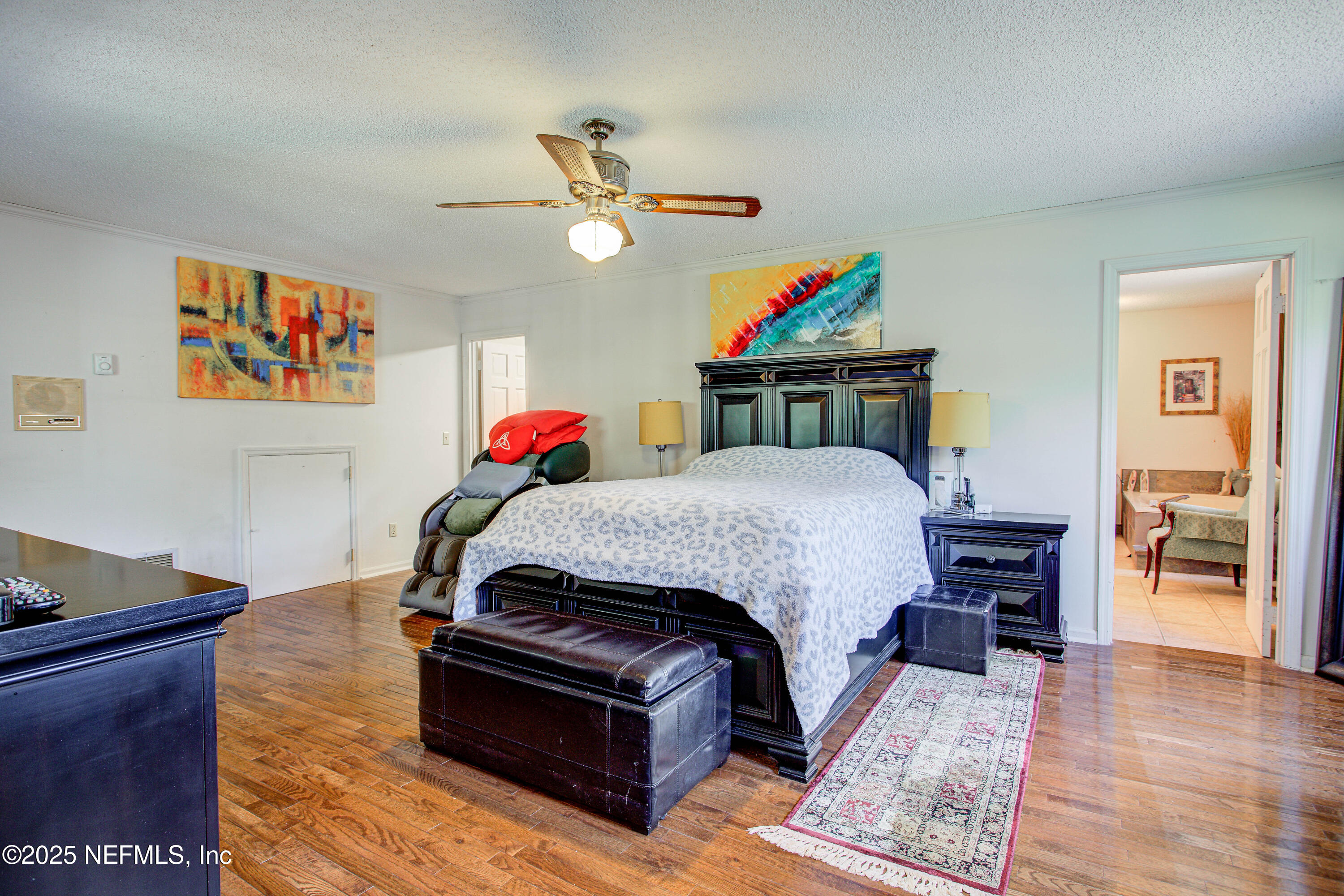 4302 Buck Point Road Jacksonville, FL 32210 - Photo 36 of 74 a living room with furniture and wooden floor