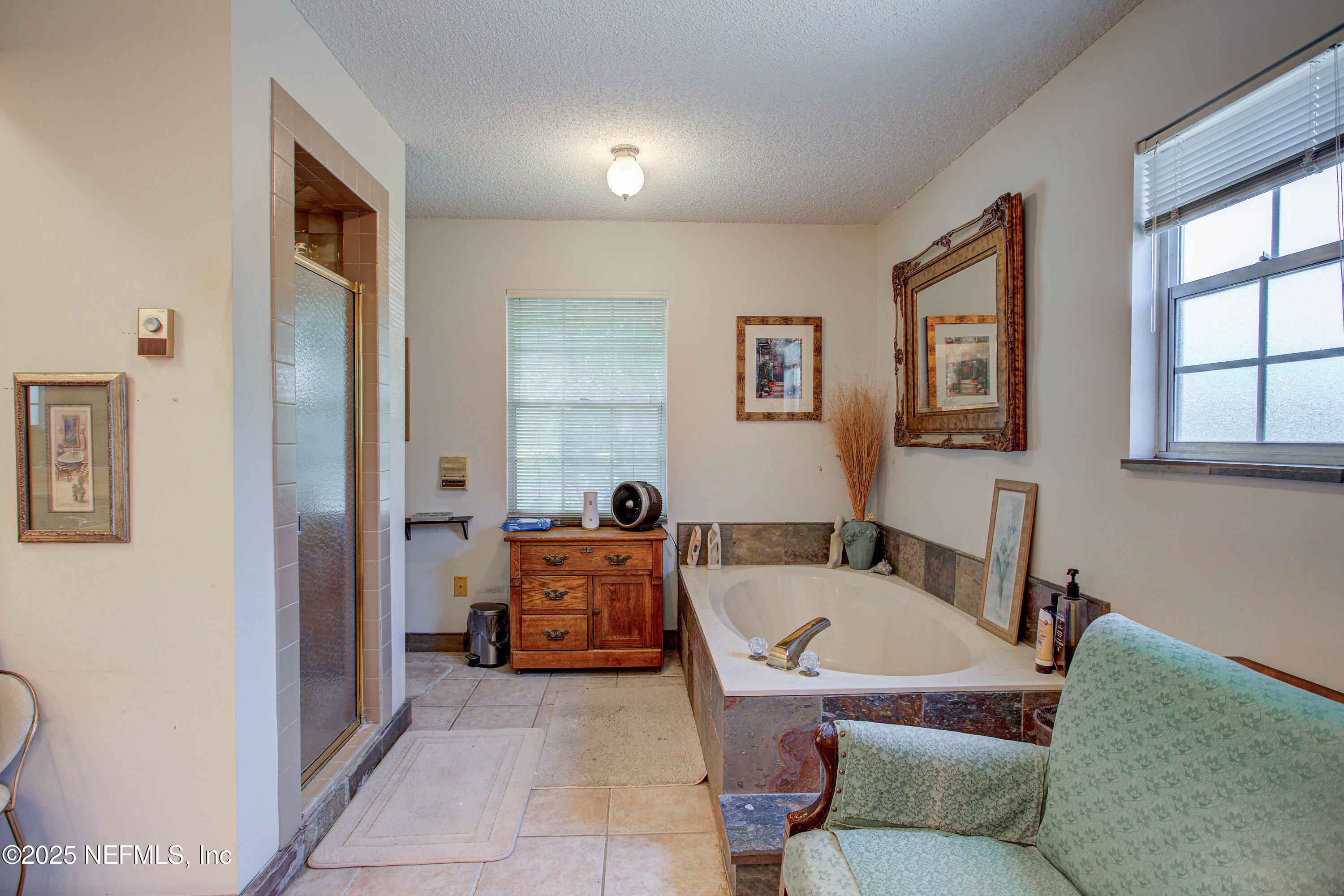 4302 Buck Point Road Jacksonville, FL 32210 - Photo 42 of 74 a view of a livingroom with furniture and windows