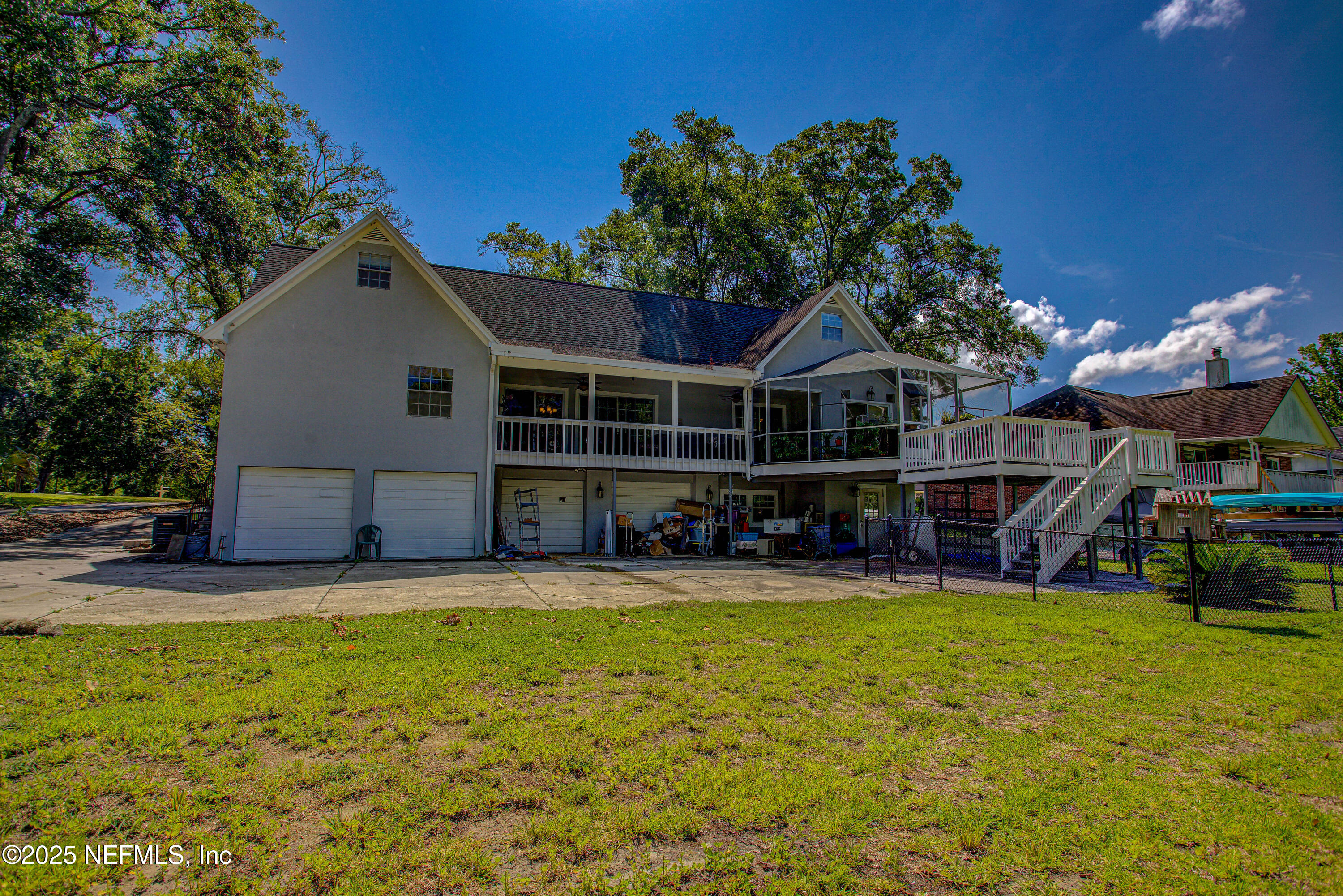 4302 Buck Point Road Jacksonville, FL 32210 - Photo 72 of 74 a view of a house with swimming pool and sitting area