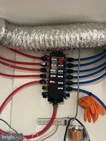 a closet with storage and utility