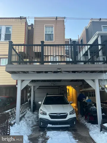 a view of a car park in front of a building