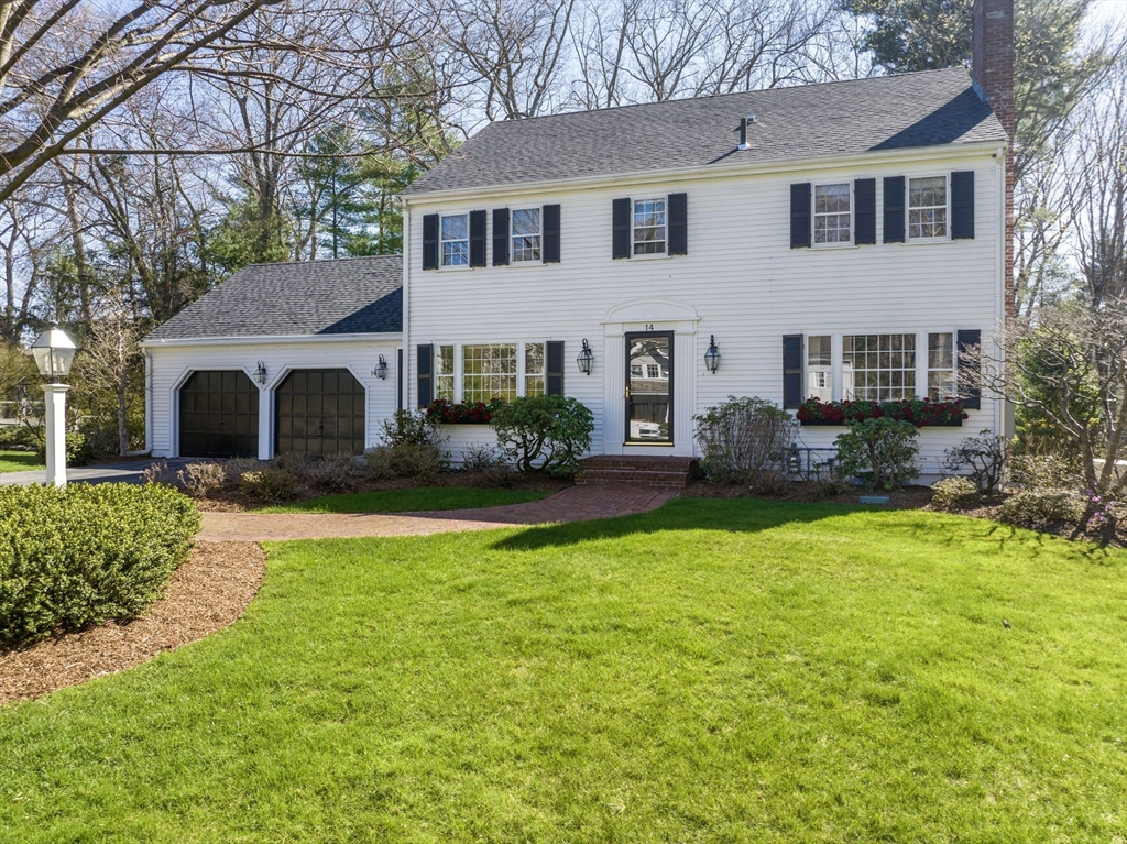 14 Colgate Road Wellesley, MA 02482 - Photo 1 of 19 a front view of a house with garden