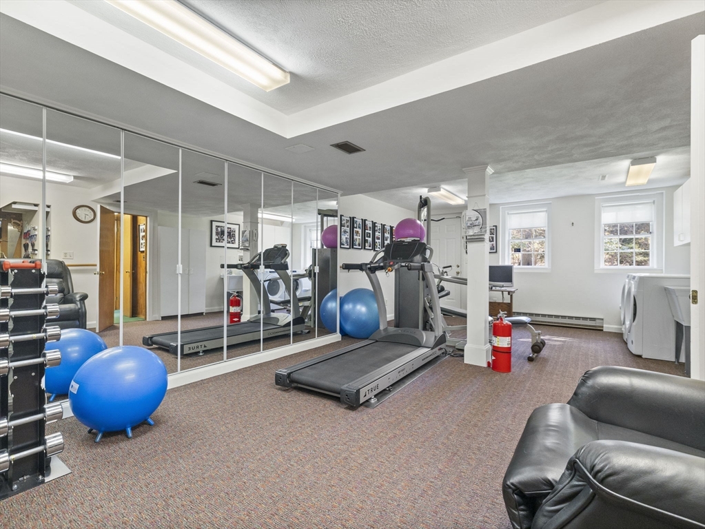 14 Colgate Road Wellesley, MA 02482 - Photo 15 of 19 a room with gym equipment