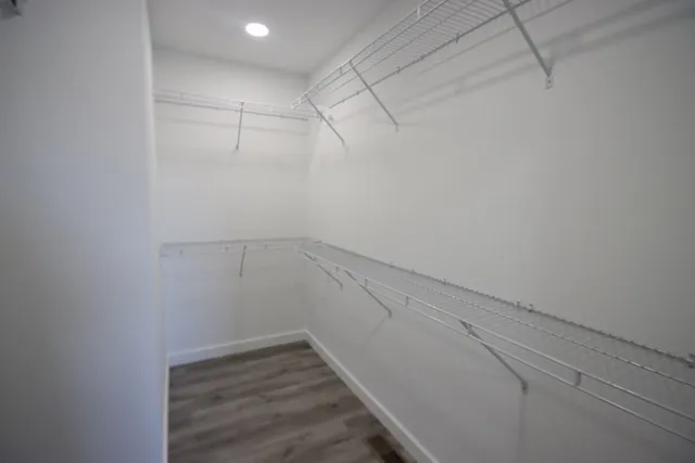 a view of a room with racks on the wall