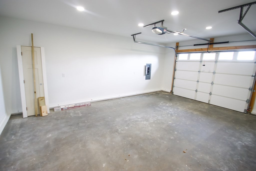 156 Will Thompson Road Sparta, TN 38583 - Photo 18 of 20 en empty room with windows and ceiling fan