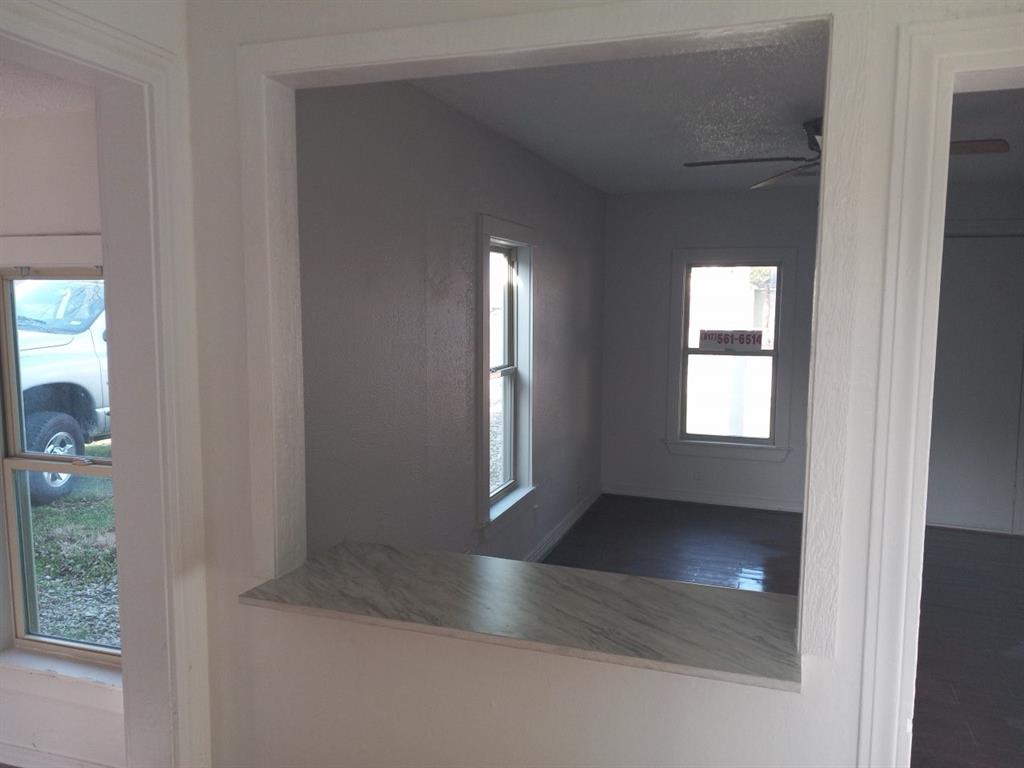 102 San Saba Avenue Benbrook, TX 76126 - Photo 7 of 25 a view of livingroom and window