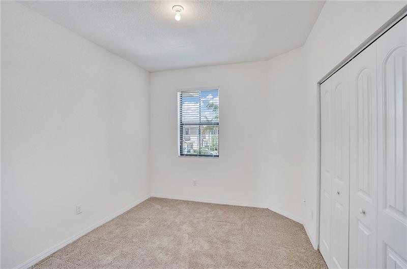 3313 Northwest 11th Avenue Pompano Beach, FL 33064 - Photo 14 of 20 an empty room with windows