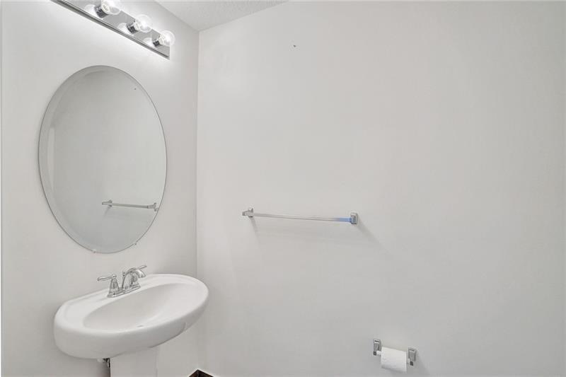 3313 Northwest 11th Avenue Pompano Beach, FL 33064 - Photo 15 of 20 a bathroom with a sink and a mirror