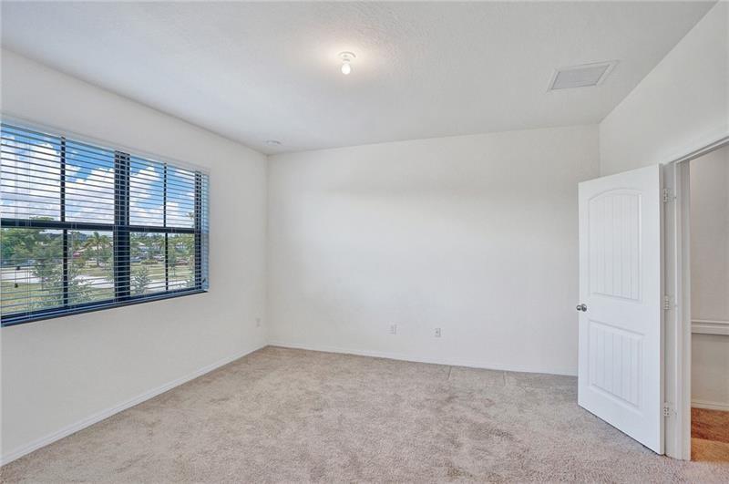 3313 Northwest 11th Avenue Pompano Beach, FL 33064 - Photo 18 of 20 an empty room with a window