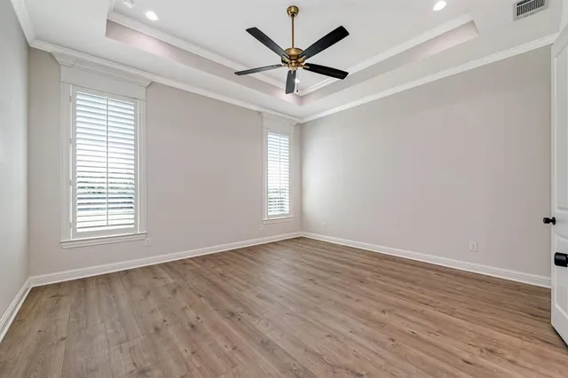 a view of a kitchen with sink and cabinets