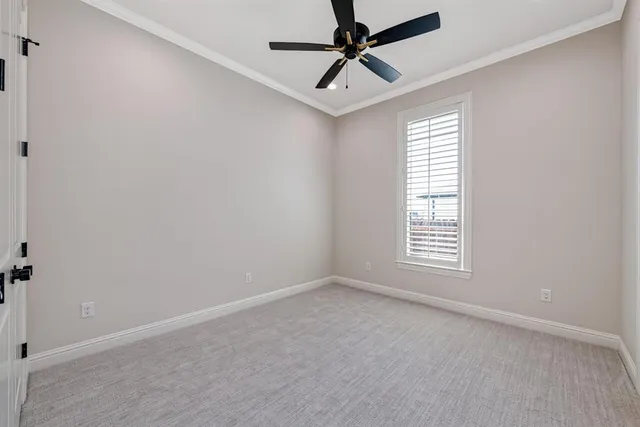 a spacious bathroom with a granite countertop sink mirror and shower