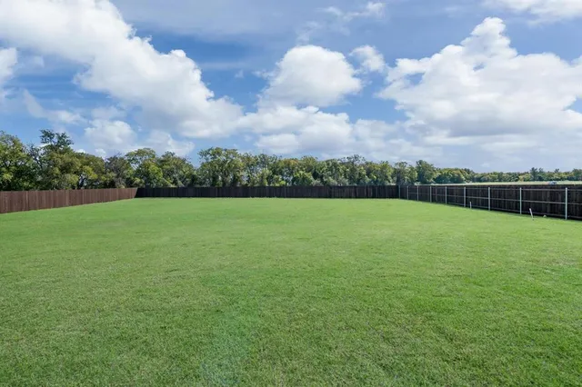 a bathroom with a sink toilet and mirror