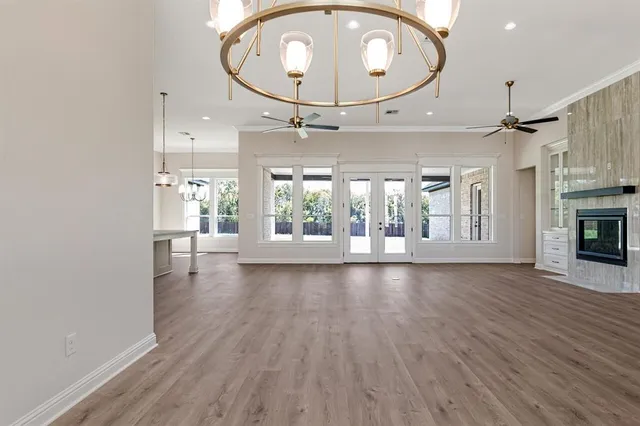 an entryway with wooden floor