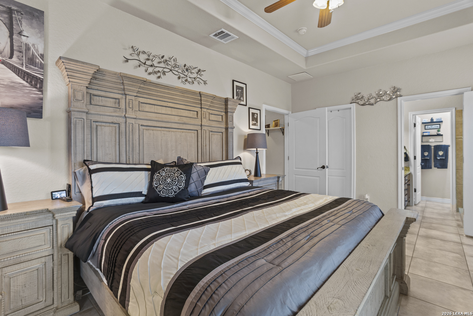 500 Wagon Train Road La Vernia, TX 78121 - Photo 19 of 44 a bedroom with double bed and a chandelier