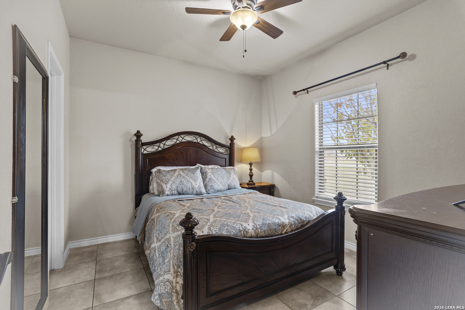 500 Wagon Train Road La Vernia, TX 78121 - Photo 23 of 44 a bedroom with a bed and window