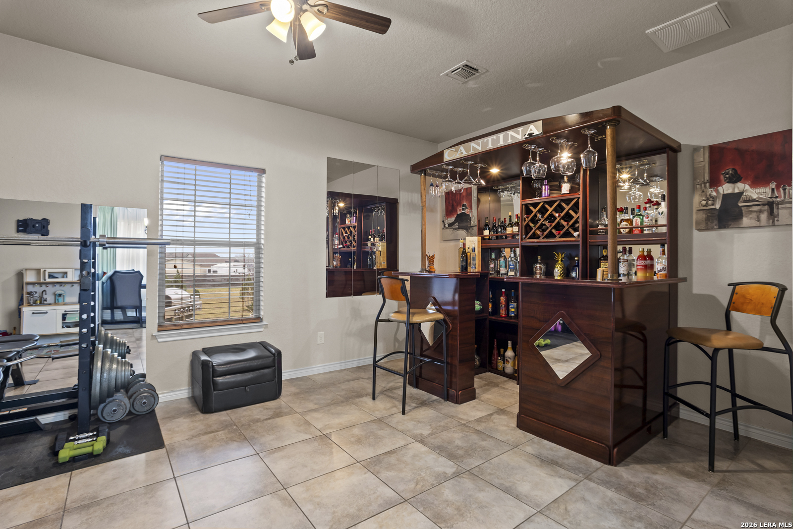 500 Wagon Train Road La Vernia, TX 78121 - Photo 26 of 44 a view of a workspace with furniture and chandelier