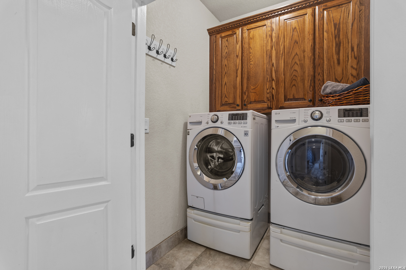 500 Wagon Train Road La Vernia, TX 78121 - Photo 29 of 44 a utility room with dryer and washer
