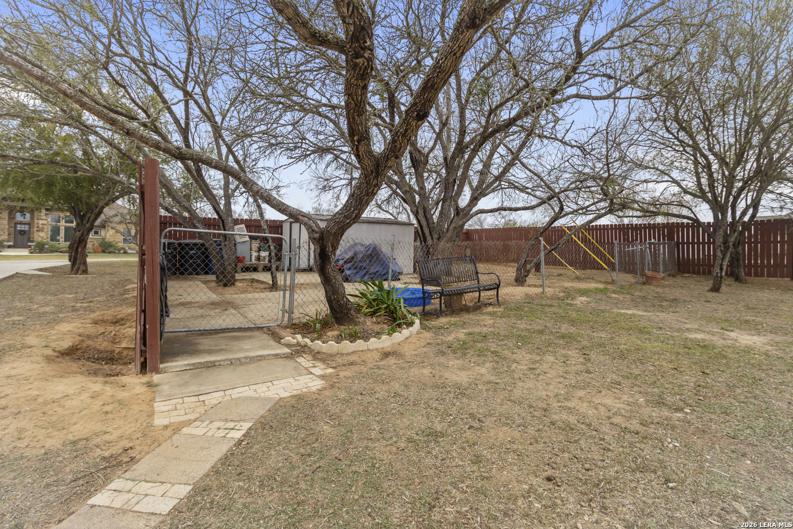 500 Wagon Train Road La Vernia, TX 78121 - Photo 36 of 44 a view of a yard with a tree