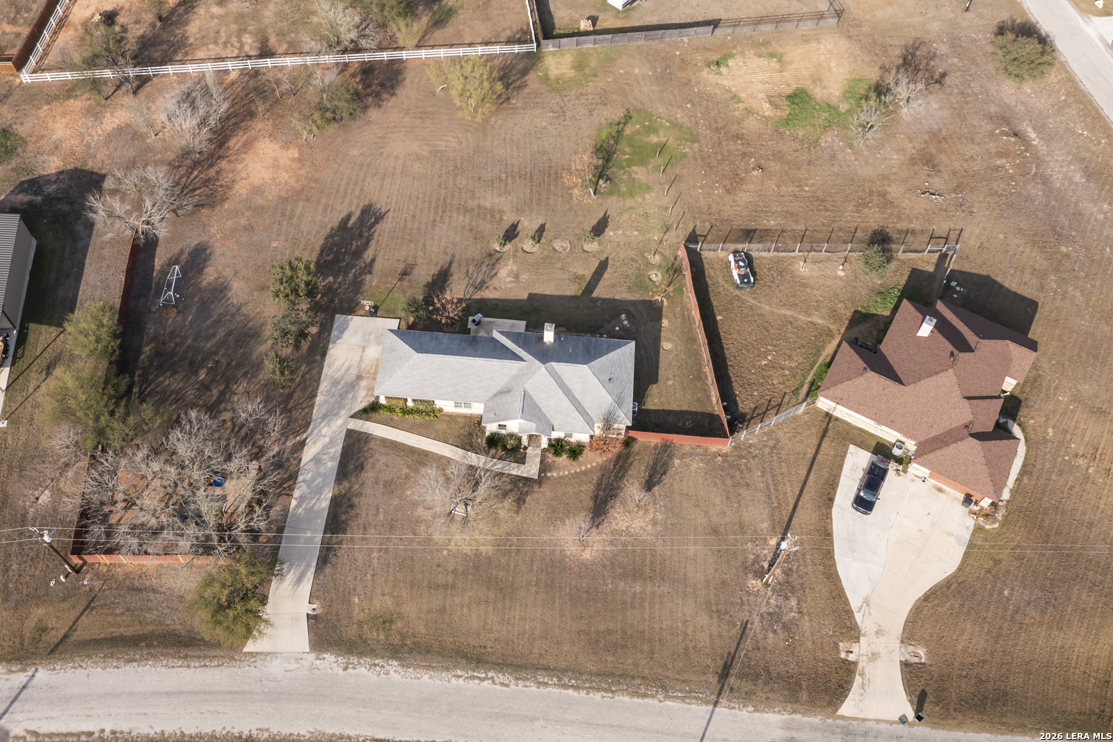 500 Wagon Train Road La Vernia, TX 78121 - Photo 44 of 44 an aerial view of a backyard with wooden floor