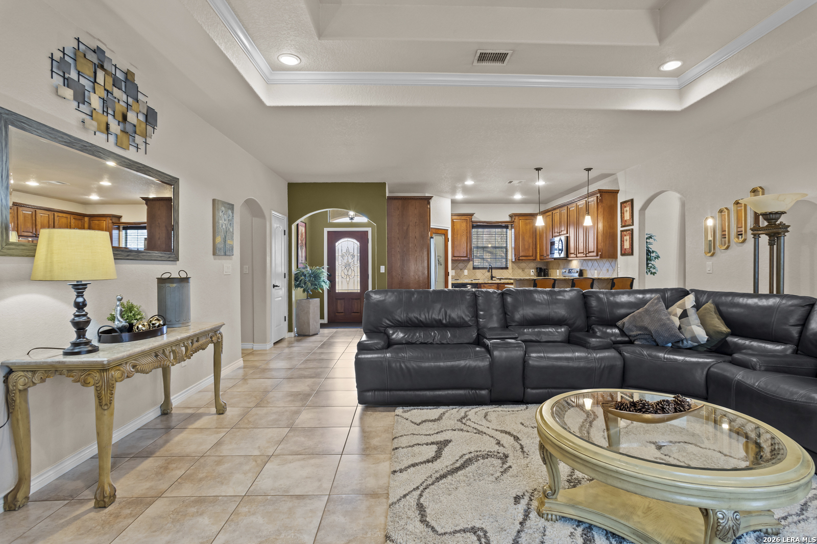 500 Wagon Train Road La Vernia, TX 78121 - Photo 7 of 44 a living room with furniture and a dining table