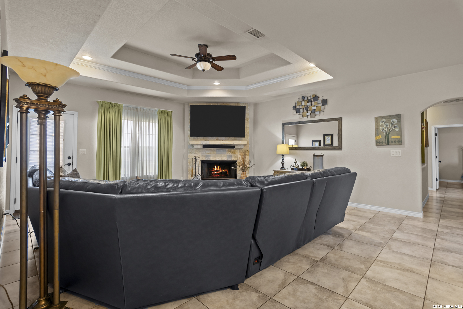 500 Wagon Train Road La Vernia, TX 78121 - Photo 10 of 44 a living room with furniture and a flat screen tv